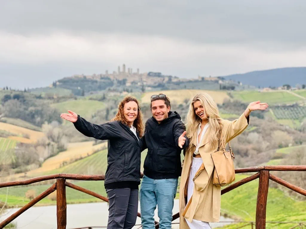 Family Having Fun In San Gimignano Tuscany